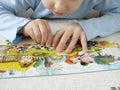 Puzzle assembling Royalty Free Stock Photo