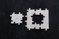 Puzzle design on black background close-up Royalty Free Stock Photo