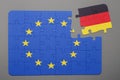 Puzzle with flag of european union and germany piece detached.