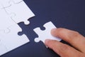 Puzzle and hand