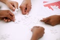 Puzzle, hands and group of people in solution, teamwork and data goals, charts or graphs connection. Team building Royalty Free Stock Photo
