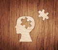 Human head profile made from brown paper with puzzle. Royalty Free Stock Photo