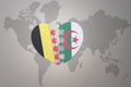 Puzzle heart with the national flag of belgium and algeria on a world map background.Concept Royalty Free Stock Photo
