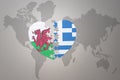 puzzle heart with the national flag of greece and wales on a world map background.Concept