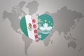 Puzzle heart with the national flag of Macau and mexico on a world map background.Concept Royalty Free Stock Photo