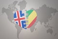 Puzzle heart with the national flag of republic of the congo and iceland on a world map background. Concept Royalty Free Stock Photo