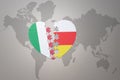 Puzzle heart with the national flag of south ossetia and italy on a world map background. Concept Royalty Free Stock Photo