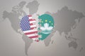 Puzzle heart with the national flag of united states of america and Macau on a world map background. Concept Royalty Free Stock Photo