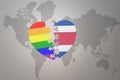 Puzzle heart with the rainbow gay flag and costa rica on a world map background. Concept Royalty Free Stock Photo