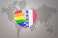 Puzzle heart with the rainbow gay flag and france on a world map background. Concept Royalty Free Stock Photo