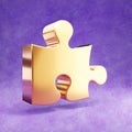 Puzzle icon. Gold glossy Puzzle symbol isolated on violet velvet background. Royalty Free Stock Photo