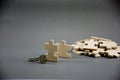 Puzzle made of wood with key.on gray background with business idea,MLM business or Businessman Steps to Success or background for Royalty Free Stock Photo