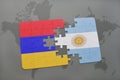 puzzle with the national flag of armenia and argentina on a world map
