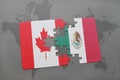 puzzle with the national flag of canada and mexico on a world map background. Royalty Free Stock Photo