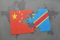 puzzle with the national flag of china and democratic republic of the congo on a world map background.