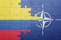 Puzzle with the national flag of colombia and nato