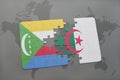 puzzle with the national flag of comoros and algeria on a world map Royalty Free Stock Photo