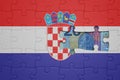 puzzle with the national flag of croatia and euro banknote. finance concept Royalty Free Stock Photo