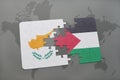 puzzle with the national flag of cyprus and palestine on a world map