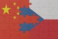 puzzle with the national flag of czech republic and china . macro.concept