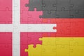 Puzzle with the national flag of denmark and germany Royalty Free Stock Photo