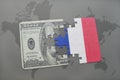 puzzle with the national flag of france and dollar banknote on a world map background. Royalty Free Stock Photo