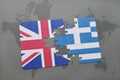 Puzzle with the national flag of great britain and greece on a world map background Royalty Free Stock Photo