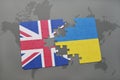 puzzle with the national flag of great britain and ukraine on a world map background Royalty Free Stock Photo