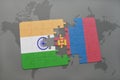 puzzle with the national flag of india and mongolia on a world map background.