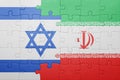 Puzzle with the national flag of iran and israel Royalty Free Stock Photo