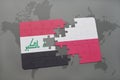 puzzle with the national flag of iraq and poland on a world map background. Royalty Free Stock Photo