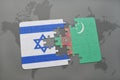 puzzle with the national flag of israel and turkmenistan on a world map background.