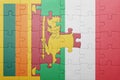 Puzzle with the national flag of italy and sri lanka