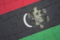 puzzle with the national flag of libya and usa dollar banknote. finance concept Royalty Free Stock Photo