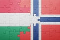 puzzle with the national flag of norway and hungary