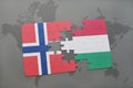 puzzle with the national flag of norway and hungary on a world map background.