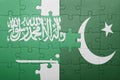 Puzzle with the national flag of pakistan and saudi arabia