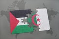 puzzle with the national flag of palestine and algeria on a world map Royalty Free Stock Photo