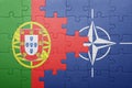 Puzzle with the national flag of portugal and nato