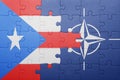 Puzzle with the national flag of puerto rico and nato