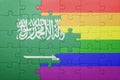 Puzzle with the national flag of saudi arabia and gay flag