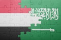 Puzzle with the national flag of saudi arabia and yemen