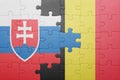 Puzzle with the national flag of slovakia and belgium