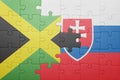 puzzle with the national flag of slovakia and jamaica