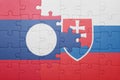puzzle with the national flag of slovakia and laos