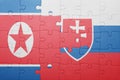 puzzle with the national flag of slovakia and north korea