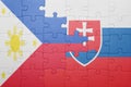 puzzle with the national flag of slovakia and philippines