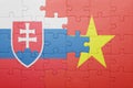 puzzle with the national flag of slovakia and vietnam
