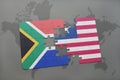 puzzle with the national flag of south africa and liberia on a world map. Royalty Free Stock Photo