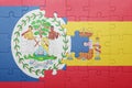 Puzzle with the national flag of spain and belize
